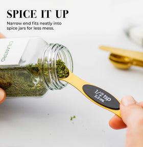 STYLED SETTINGS dual-ended spoons for dry and wet ingredients.