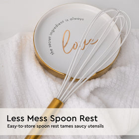 Styled Settings gold accent details add luxe styling to a white and gold kitchen