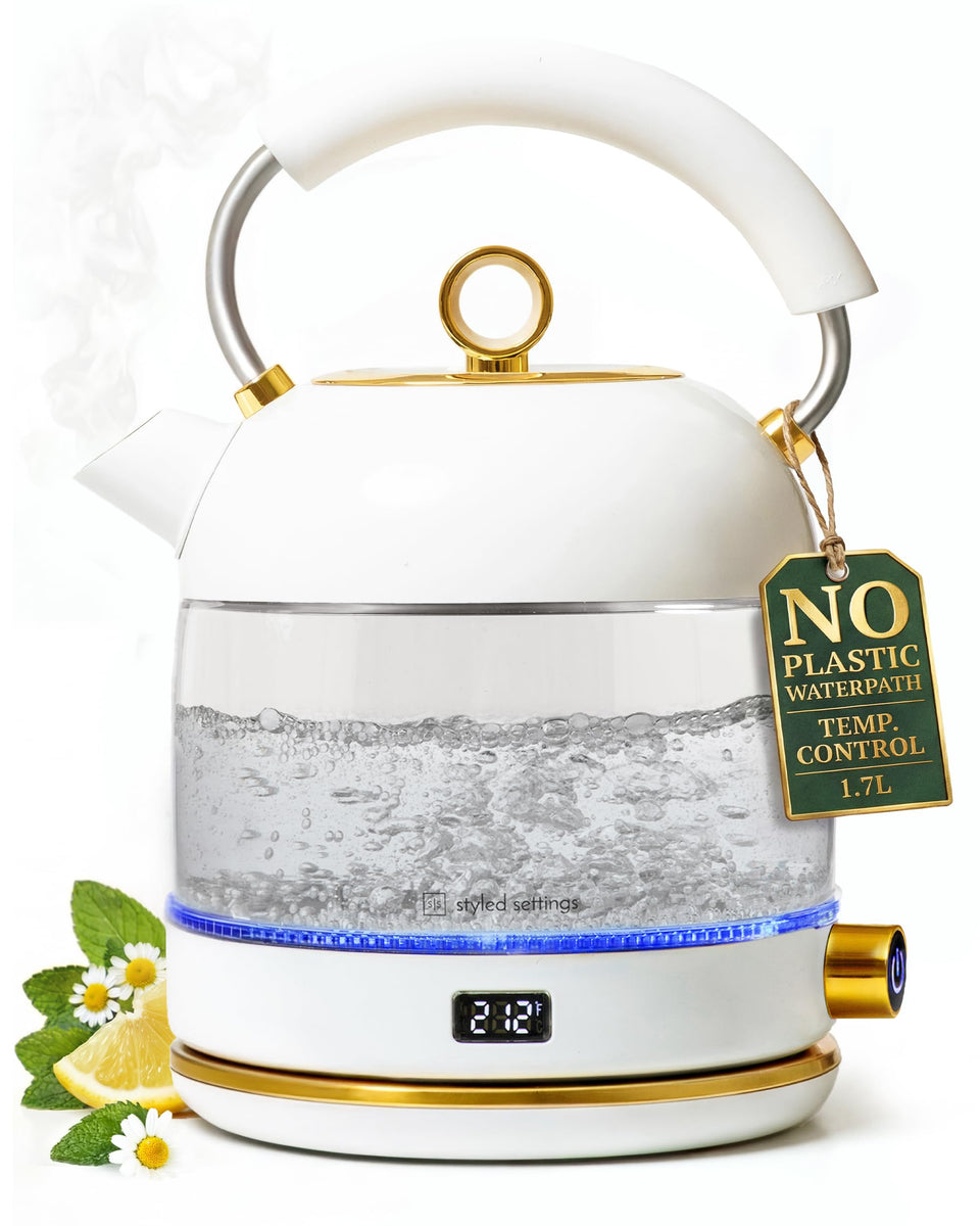 Styled Settings white electric tea kettle pour showcases sleek design and quick pour control.