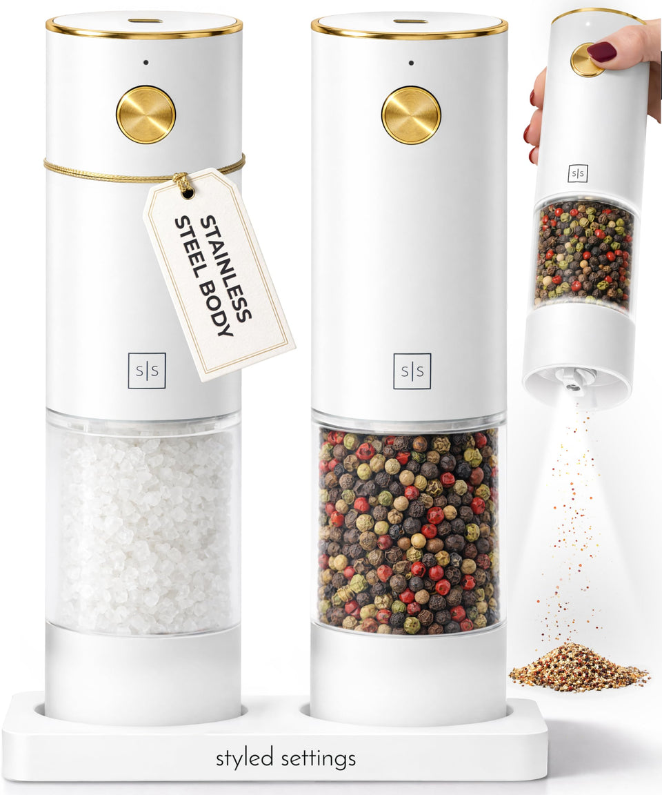 STYLED SETTINGS white grinder set on wood base for stylish, effortless seasoning.