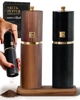 STYLED SETTINGS wooden salt and pepper grinders on a table for stylish seasoning