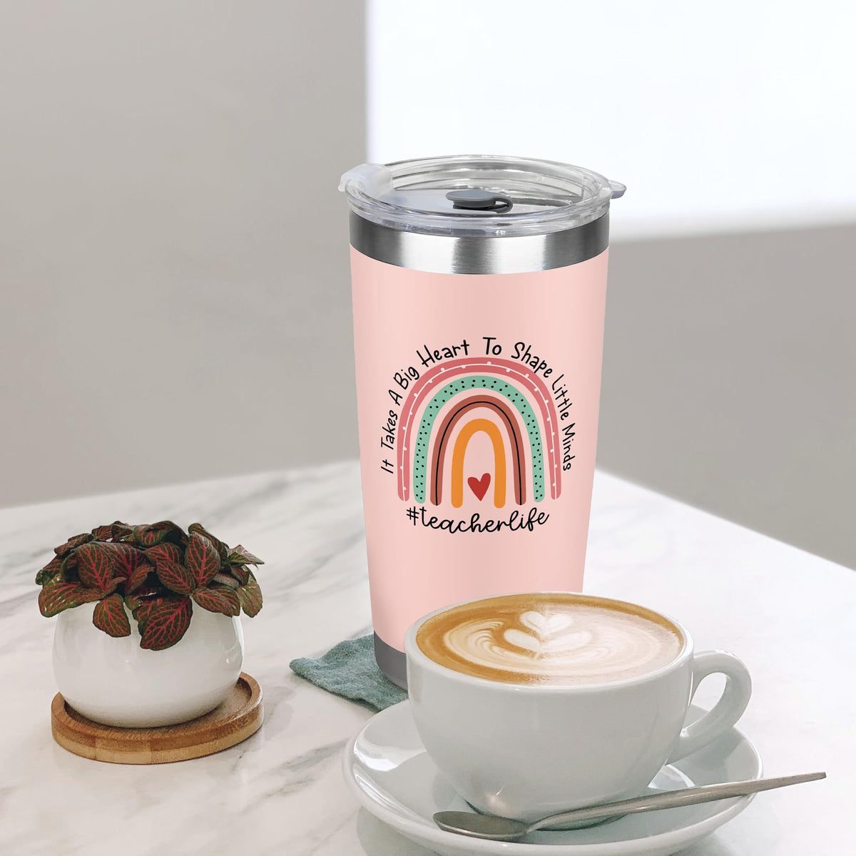 Suchagift pink tumbler shown on a desk setup for daily use