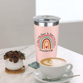 Suchagift pink tumbler shown on a desk setup for daily use
