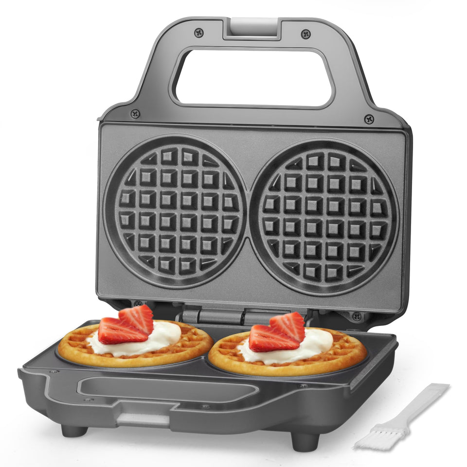 SugarWhisk 4-inch double mini waffle maker closed, compact grey kitchen appliance.