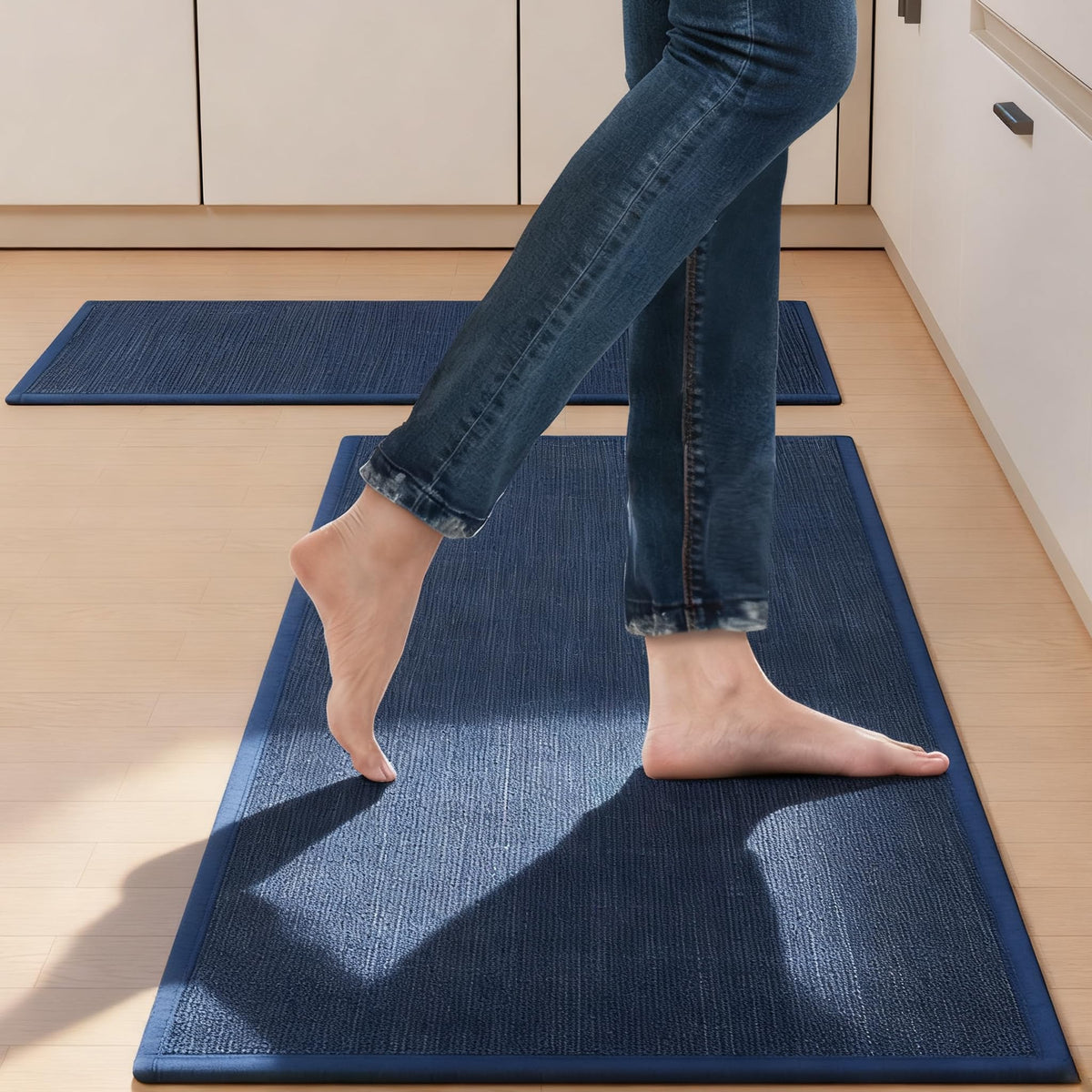 SUMLANS kitchen mat absorbent-surface traps spills to keep floors drier.