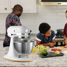 Compact bamboo slider keeps countertops tidy during meal prep