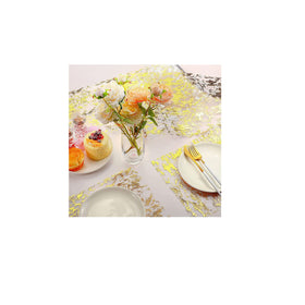 Gold foil finish adds a subtle shine to tables in warm lighting.