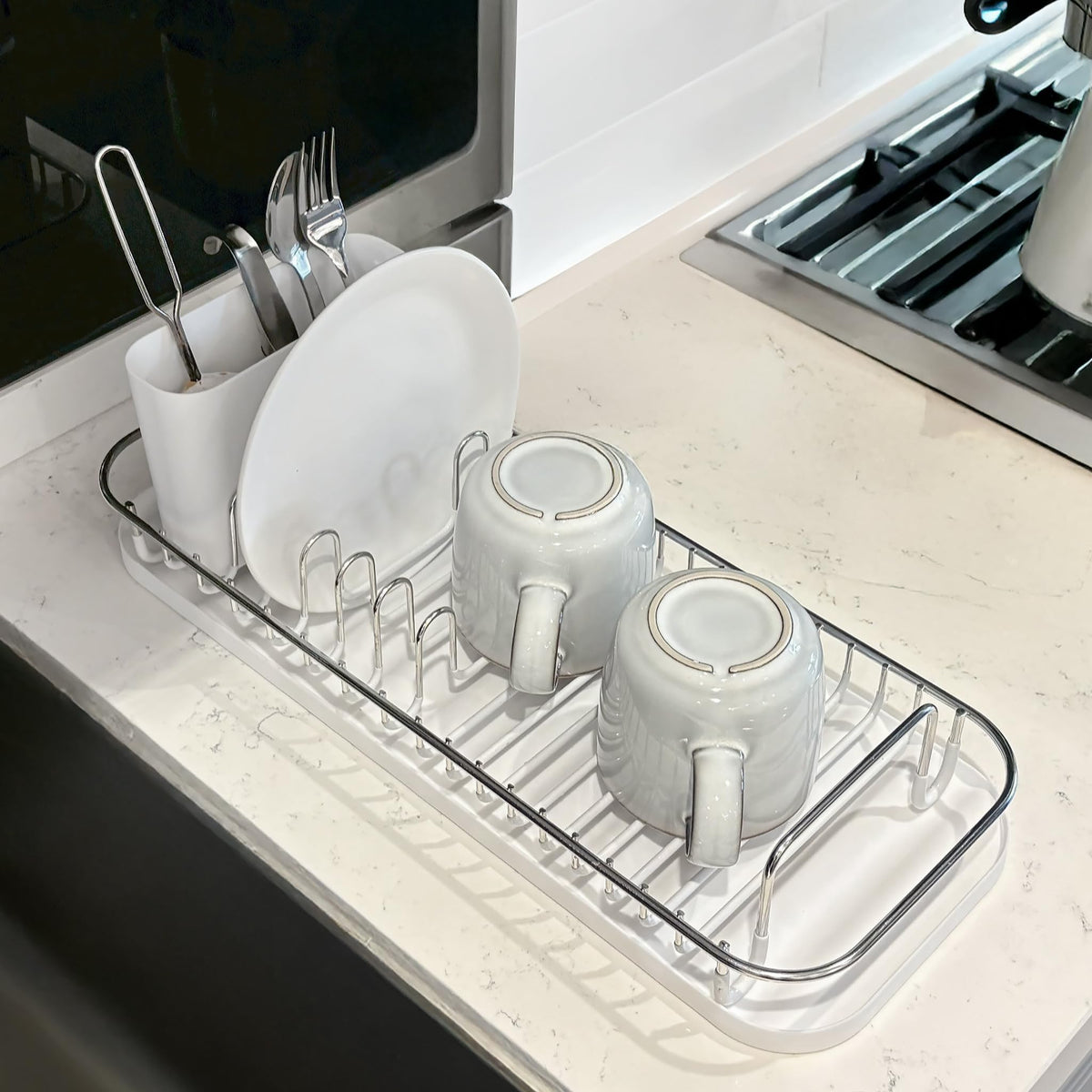 SunnyPoint NeverRust over-sink rack drains efficiently to save counter space.
