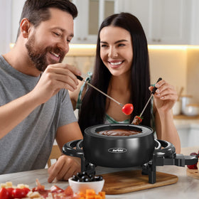 Sunvivi cheese fondue and hot-pot setup for meats and vegetables.