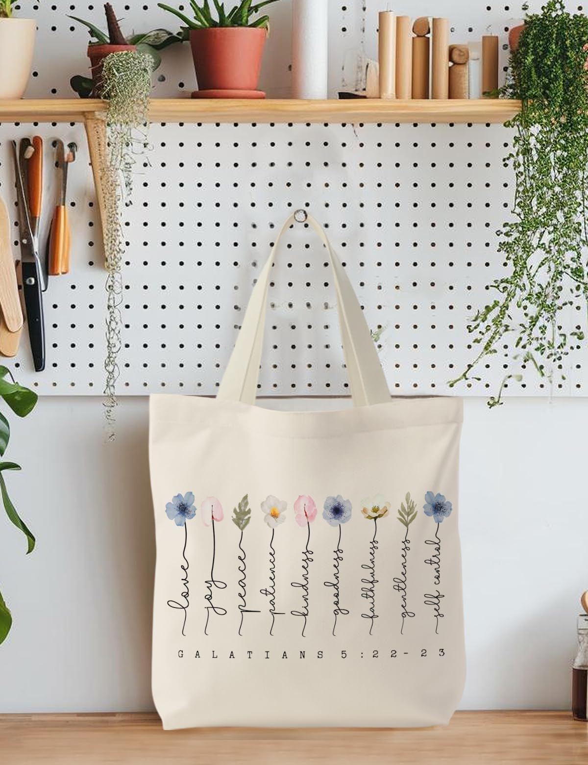 Supwhd canvas tote shows durable stitching and artistic print for lasting use.