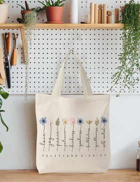 Supwhd canvas tote shows durable stitching and artistic print for lasting use.