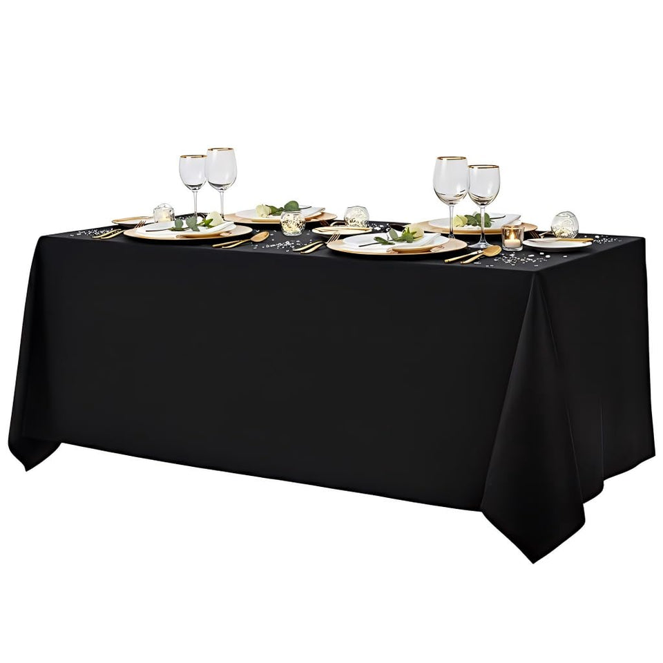 Surmente black rectangle tablecloth draped on a 6-8 ft table for a polished banquet look.