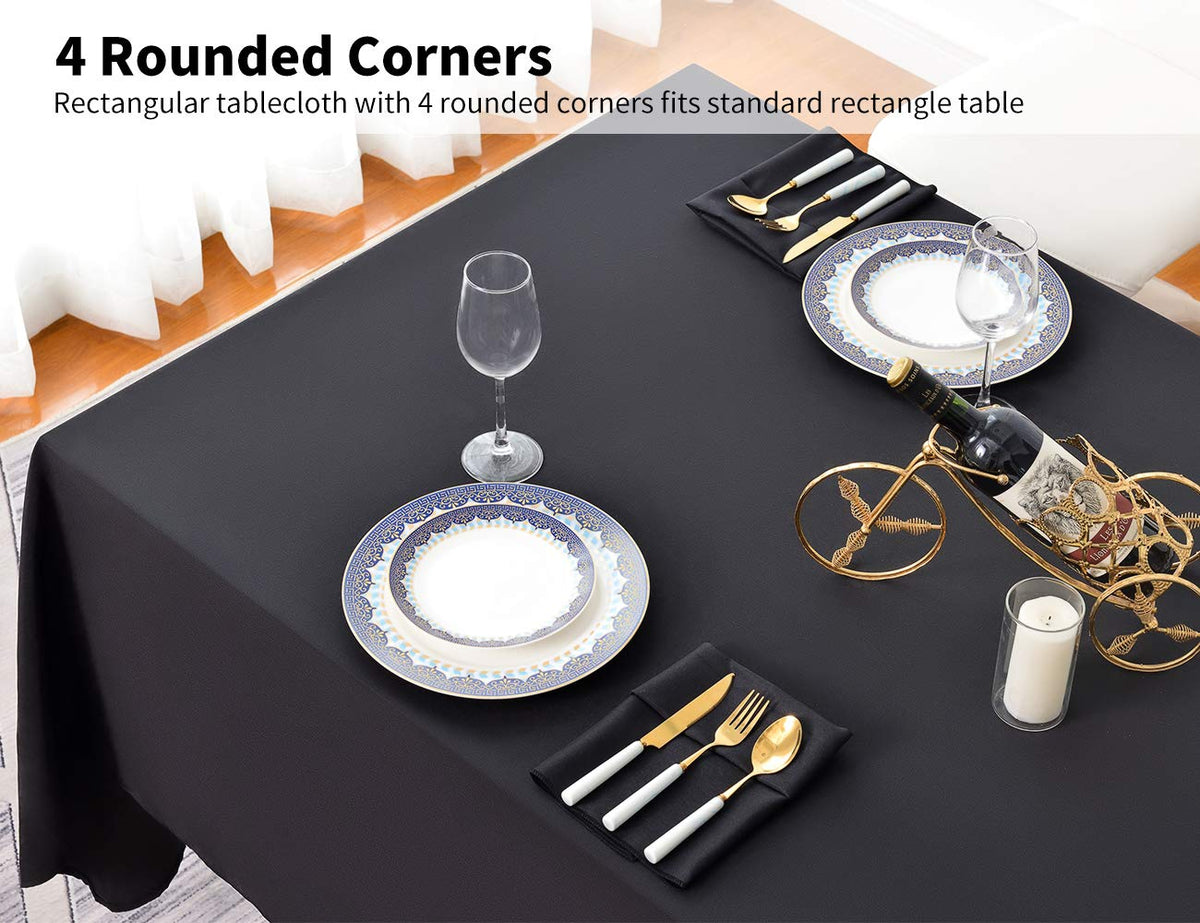 Surmente wedding banquet setup with a 90x132 black tablecloth for a formal look.