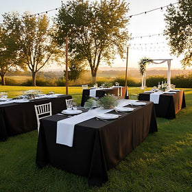 Surmente tablecloth shown indoors and outdoors for versatile use and durable coverage.