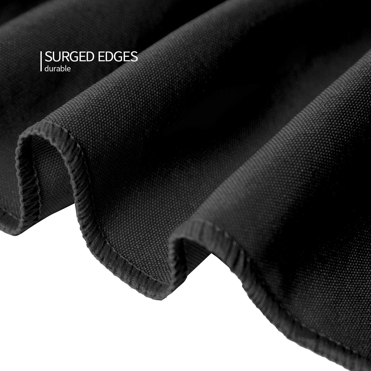 Wedding table setup with Surmente black fitted tablecloth for elegant ambiance