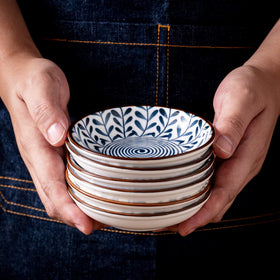 Suwut blue and white patterned bowls add elegant table presentation and portion control