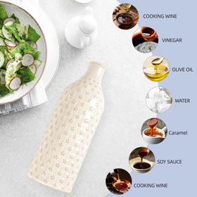 Versatile dispenser suitable for olive oil, vinegar, or sauces.