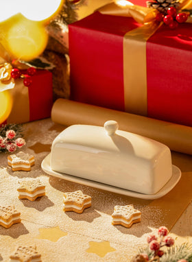 Sweese butter dish with lid open, full-size butter stick visible.