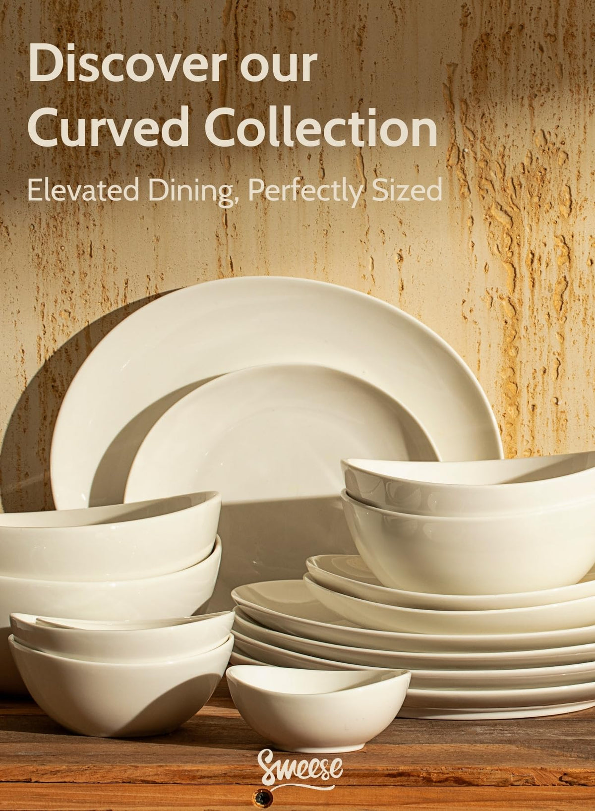 Sweese elegant dining setup with six white plates on a table.