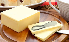 Sweetfamily kitchen scene showing spreaders and tongs for versatile use.