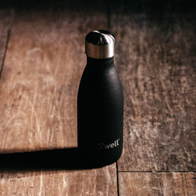 S'well Onyx 9oz bottle packaging signals a sustainable hydration choice.