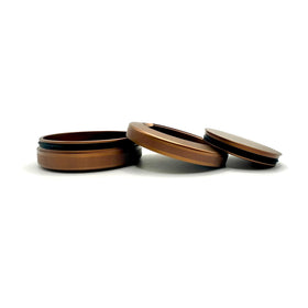 Syn Tin Liberty dual-compartment case with knurled grip for secure transport.
