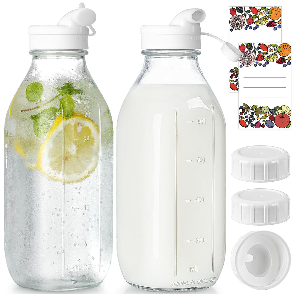 Syntic 2-pack glass milk bottle with dispenser caps for clean, controlled pouring.