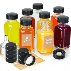 Syntic Clear ginger shot bottle front view, portable 2 oz size for travel.