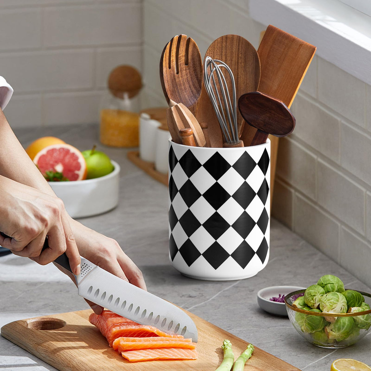 SYXUPUMI ceramic utensil holder offers deep capacity for spoons and spatulas.