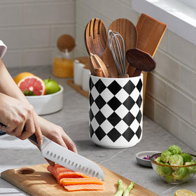 SYXUPUMI ceramic utensil holder offers deep capacity for spoons and spatulas.