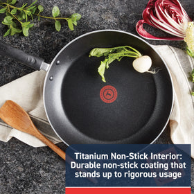 T-Fal Experience non-stick fry pan lid closed emphasizes moisture retention and monitoring.