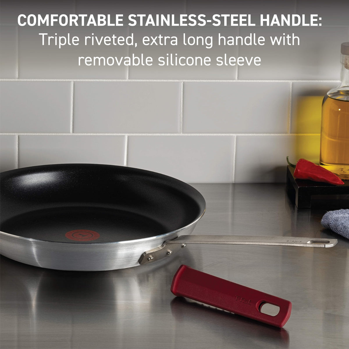 T-Fal VX3 Thermo-Spot heat indicator shows preheating readiness.