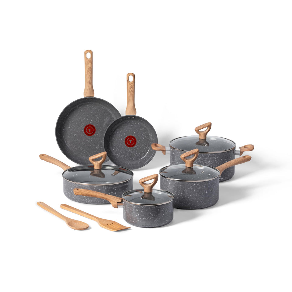 T-Fal Revive 12-piece ceramic set on stove with nonstick surface.