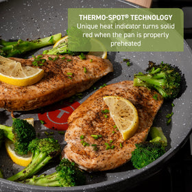 Soft-touch wood-look handle on a Revive pan.