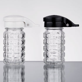 Tablecraft salt and pepper shakers in clear glass for visibility.