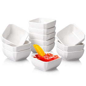Taeochiy 12-pack ceramic dipping bowls on a platter for organized sauce service.