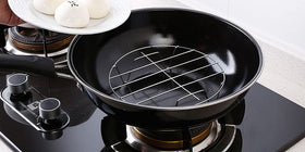 TamBee canning rack supports small jars securely during processing.