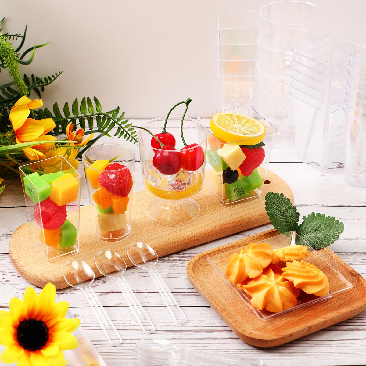 Tanlade clear plastic plates provide stable bases for mini desserts.
