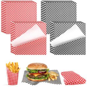 Tanlade deli paper sheets 12x12 black checkered pattern, grease resistant for neat packaging.