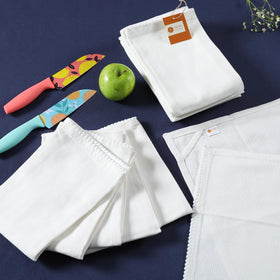 TARAN LIVING towel shown on a hanging loop for easy storage.