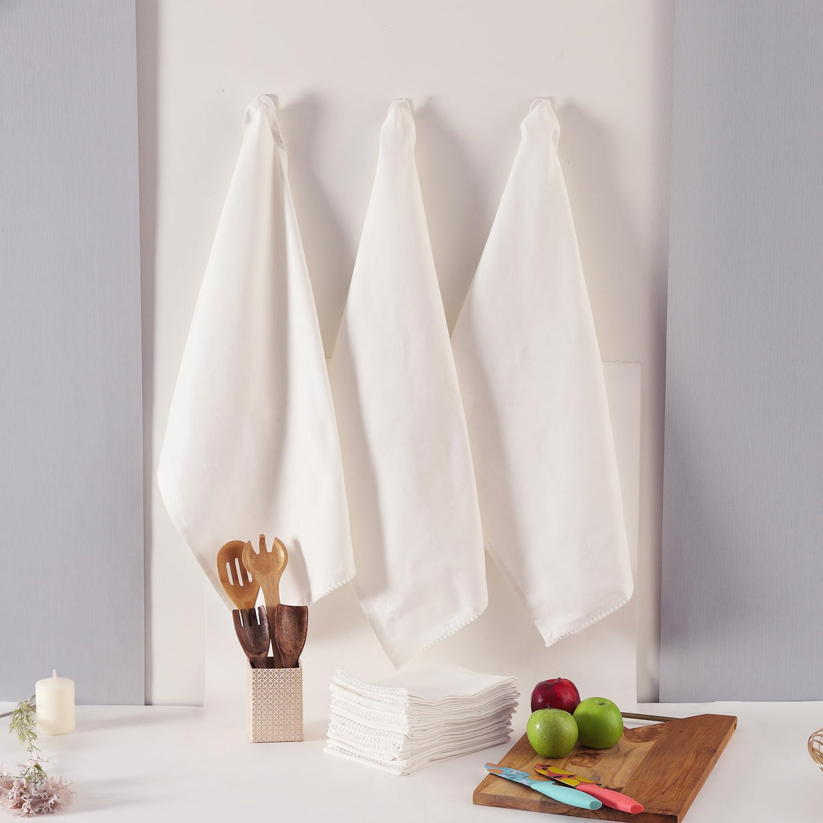 Pack of six TARAN LIVING towels arranged for cohesive styling.