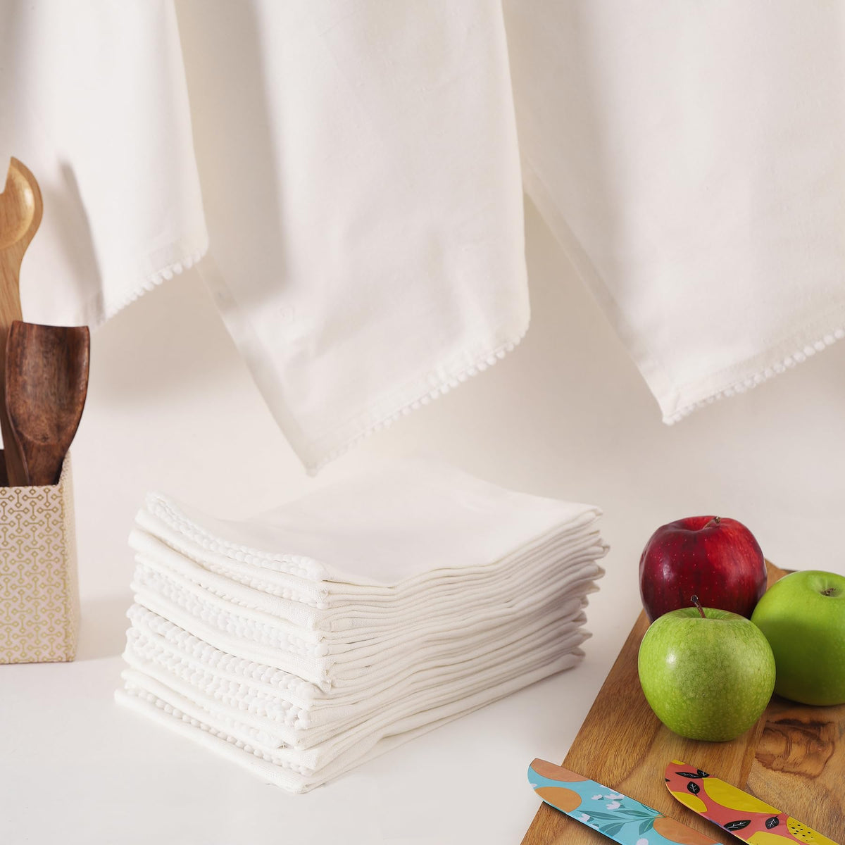 TARAN LIVING solid white towel with trim for minimalist kitchen styling.