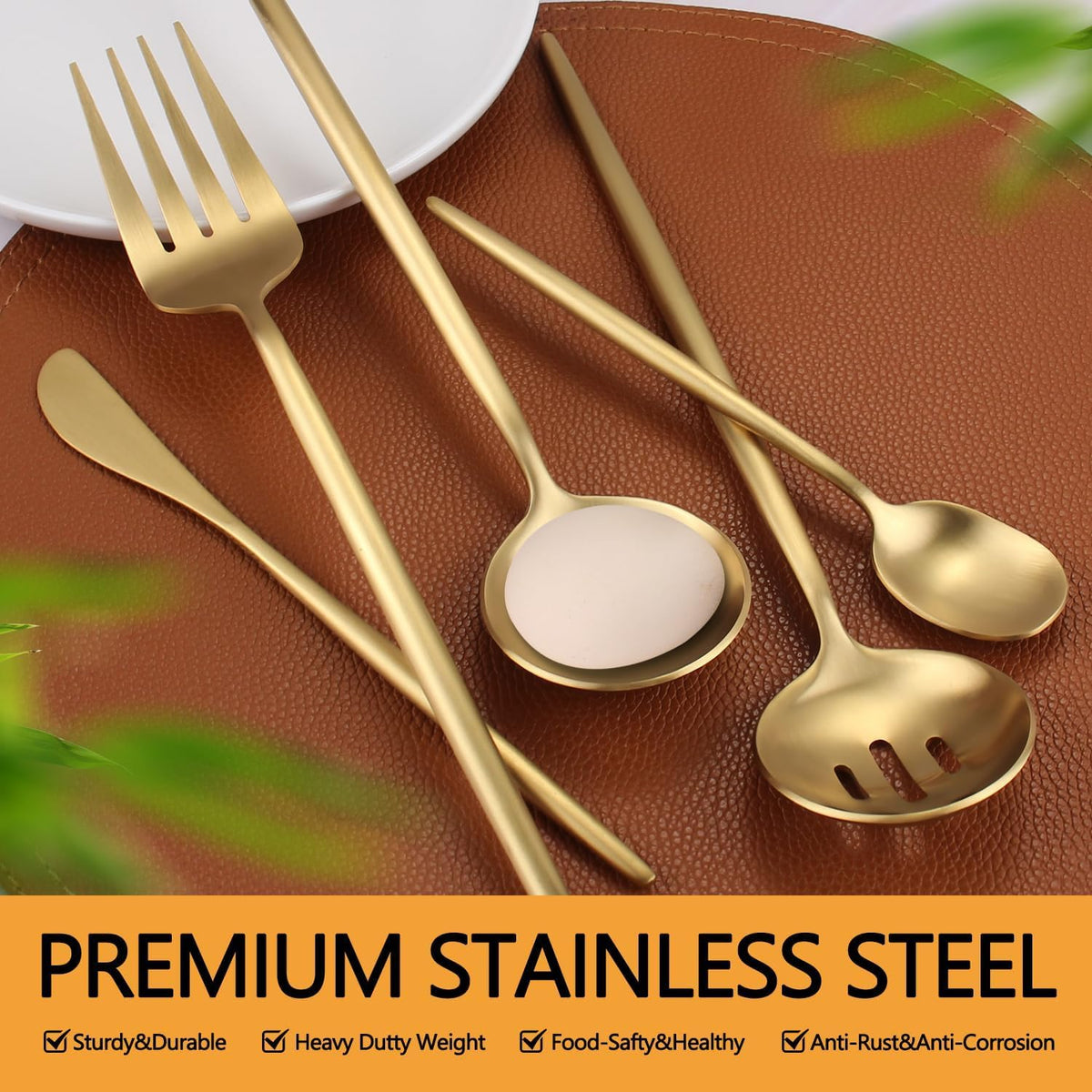 Targzier gold serving spoon paired for coordinated table setting.