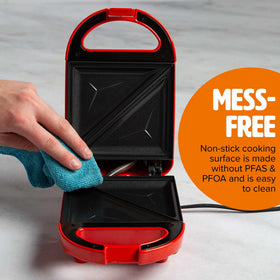 Tasty Mini Sandwich Maker on kitchen counter with ingredients, ready for a quick breakfast.
