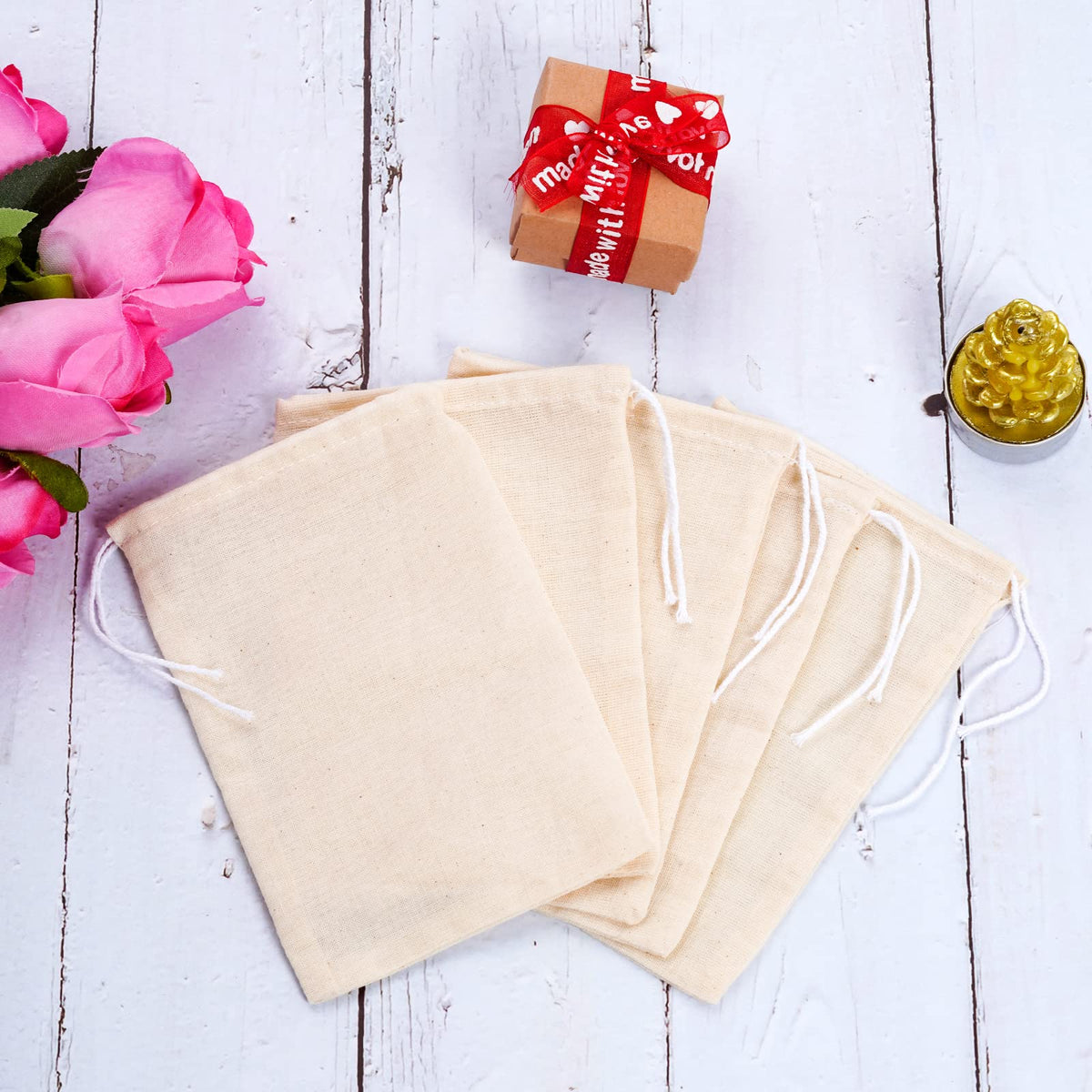Natural color Tayfremn bags with drawstrings for DIY gift packaging.