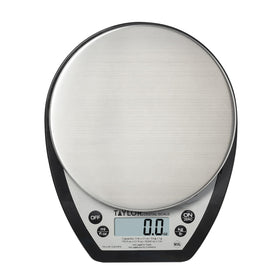 Taylor 1020NFS weighing dry and liquid ingredients for versatile recipe prep.
