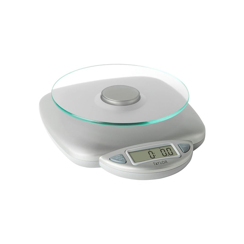 Taylor 11lb digital kitchen scale with glass top for precise baking measurements.