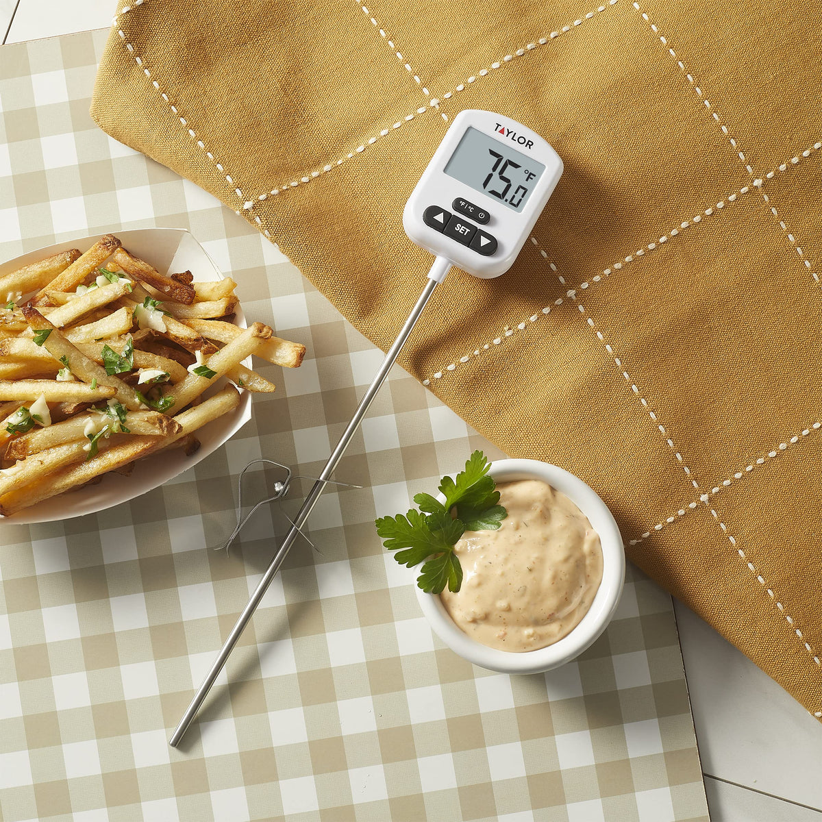 Taylor adjustable pan clip keeps thermometer secure while simmering or frying.