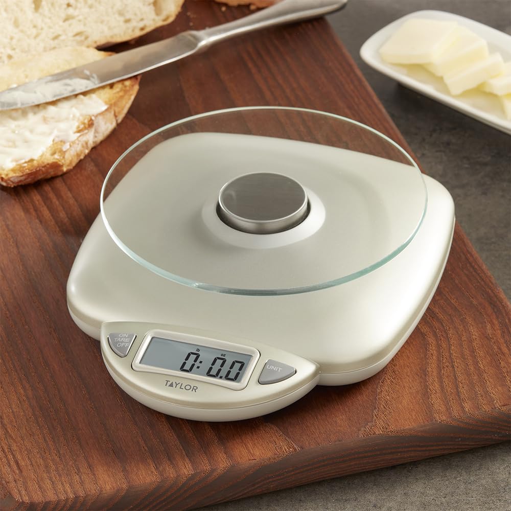 Taylor scale shows grams and ounces for versatile meal prep.