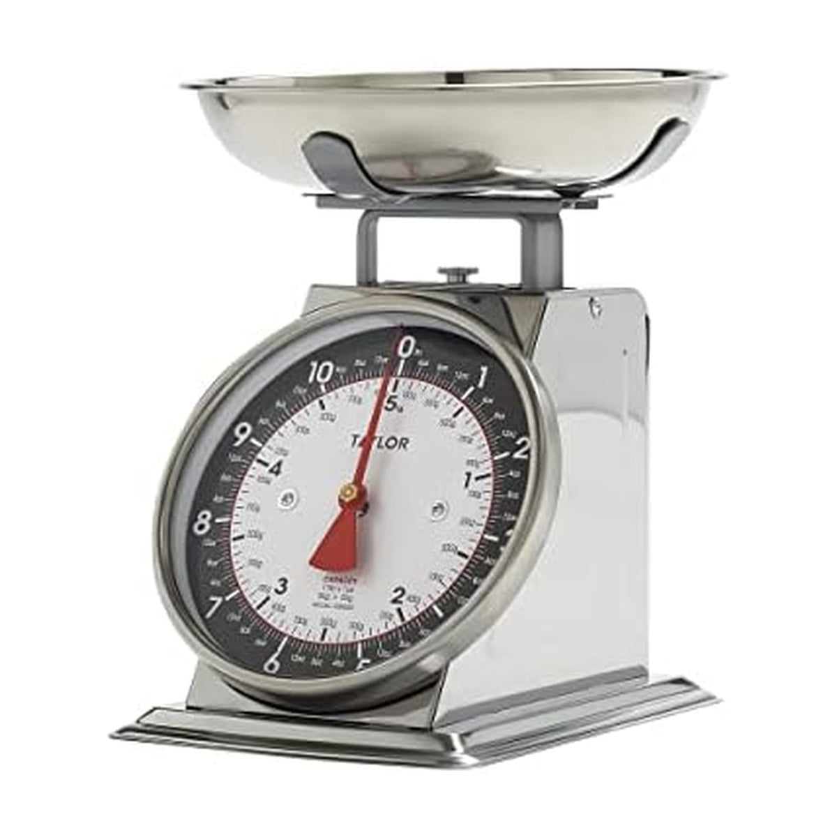 Taylor mechanical scale with removable bowl on a kitchen counter for precise ingredients.